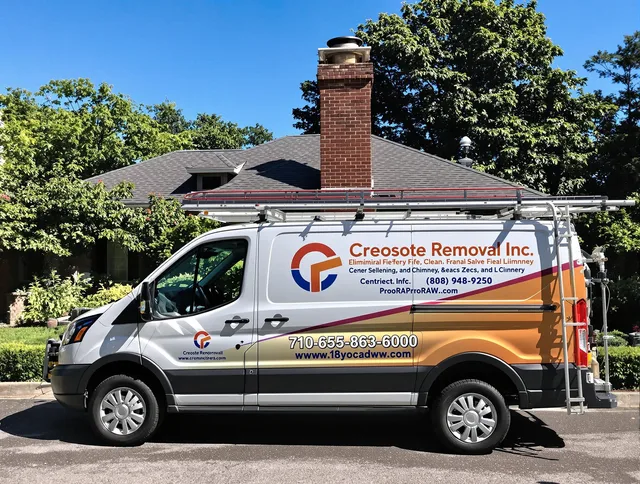 Central Falls Chimney Sweep technician removing creosote safely in Central Falls, RI